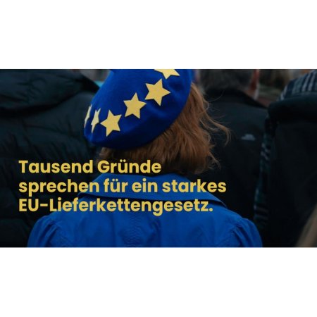 A woman wears a hat with the EU stars. The slogan "1000 reasons for a strong EU supply chain law"